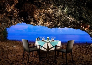 The Romantic Cave Dining at the Serene Beach of Samabe Bali Suites & Villas