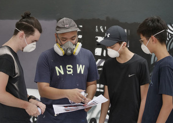 Students Collaborate with Indonesian Mural Artist Darbotz to Create Urban Street Art