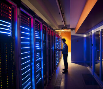 Technician managing servers in a data centre in Indonesia
