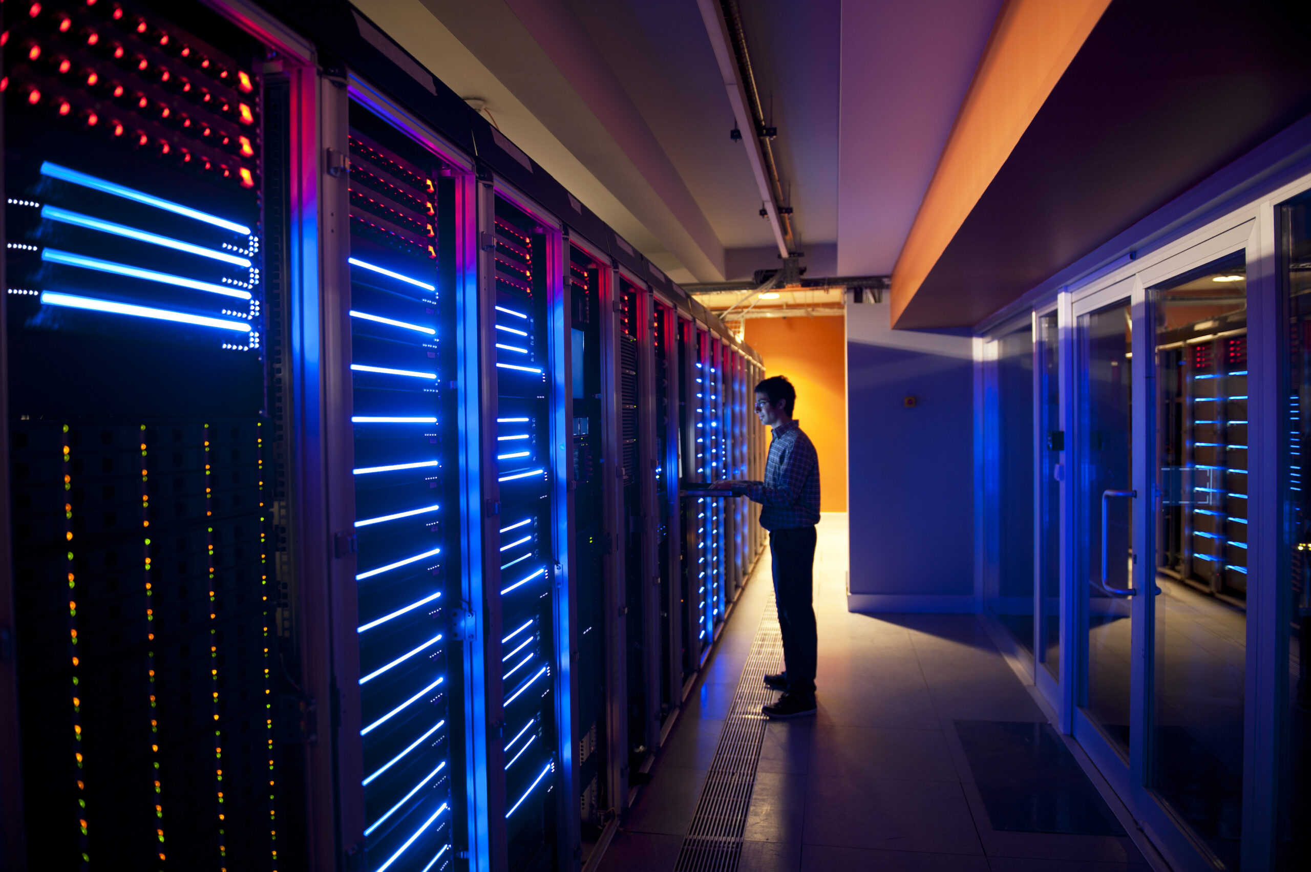 Technician managing servers in a data centre in Indonesia